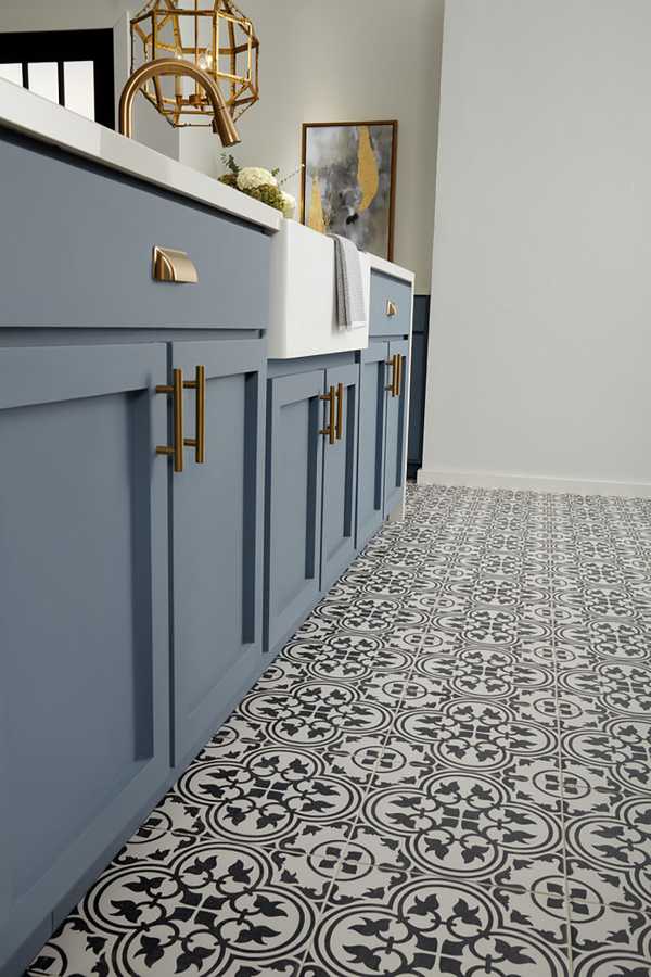 blue kitchen with patterned tile